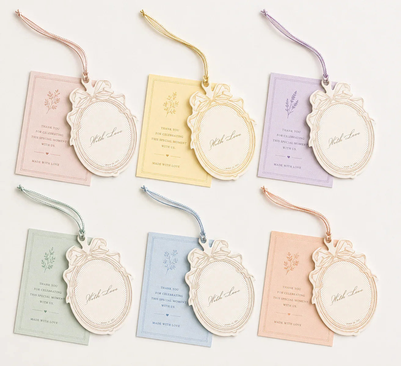 Elegant wedding favor tags Pakistan with pastel cards and 'With Love' frames